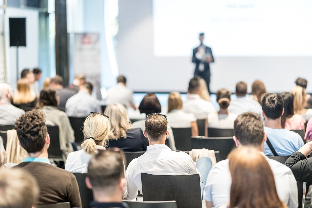 Individuals at a conference